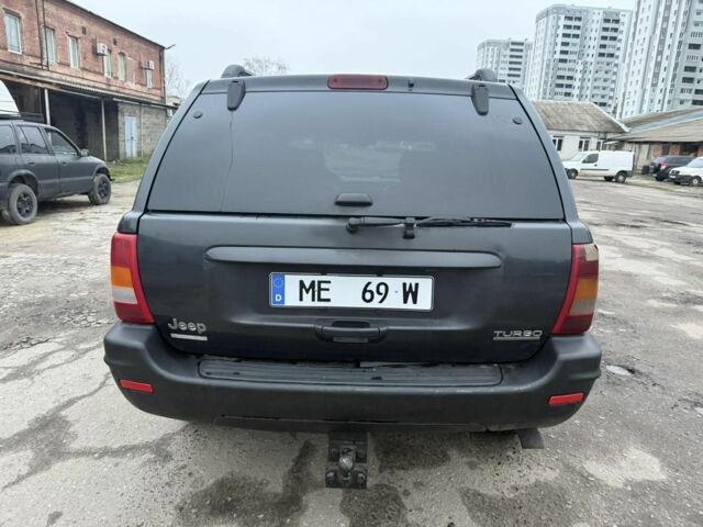 Черный Джип Гранд Чероки, объемом двигателя 2.5 л и пробегом 266 тыс. км за 3700 $, фото 5 на Automoto.ua