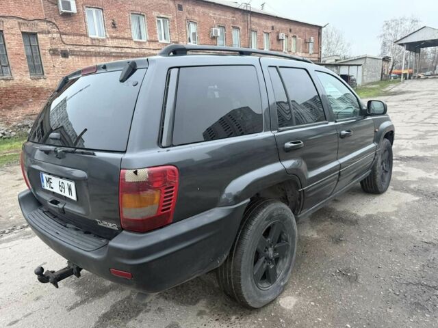 Черный Джип Гранд Чероки, объемом двигателя 2.7 л и пробегом 266 тыс. км за 3700 $, фото 1 на Automoto.ua