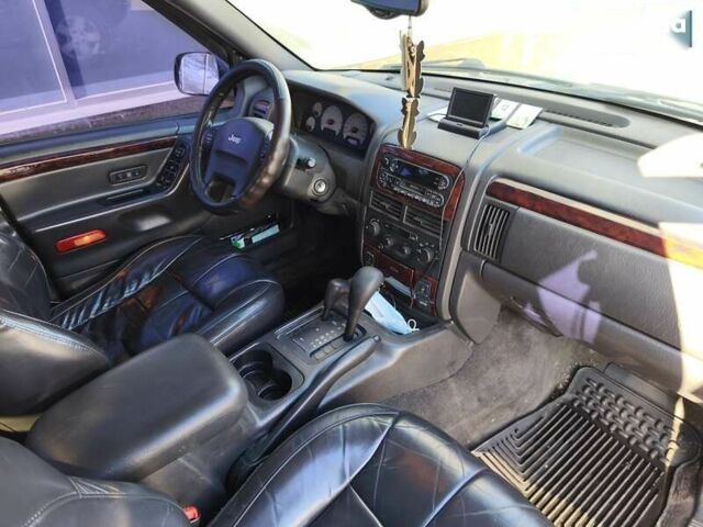 Чорний Джип Grand Cherokee, об'ємом двигуна 4.7 л та пробігом 350 тис. км за 6999 $, фото 19 на Automoto.ua