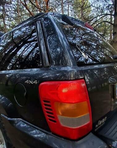 Чорний Джип Grand Cherokee, об'ємом двигуна 3.12 л та пробігом 240 тис. км за 8700 $, фото 33 на Automoto.ua