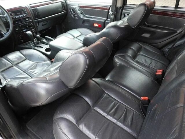 Черный Джип Гранд Чероки, объемом двигателя 2.7 л и пробегом 259 тыс. км за 3800 $, фото 6 на Automoto.ua