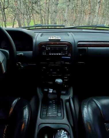 Чорний Джип Grand Cherokee, об'ємом двигуна 3.12 л та пробігом 240 тис. км за 8600 $, фото 51 на Automoto.ua