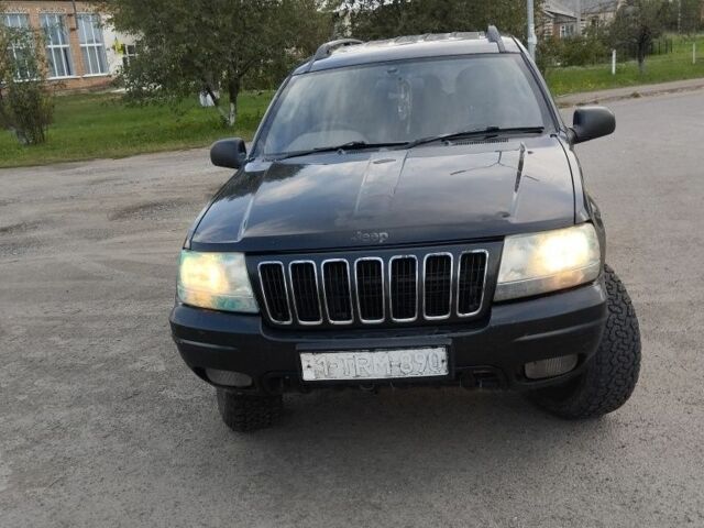 Чорний Джип Grand Cherokee, об'ємом двигуна 2.7 л та пробігом 180 тис. км за 3999 $, фото 1 на Automoto.ua