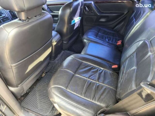Чорний Джип Grand Cherokee, об'ємом двигуна 4.7 л та пробігом 350 тис. км за 6999 $, фото 14 на Automoto.ua