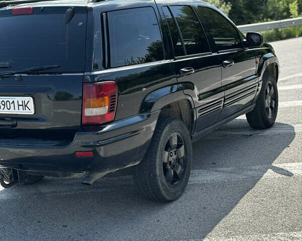 Чорний Джип Grand Cherokee, об'ємом двигуна 2.69 л та пробігом 257 тис. км за 7700 $, фото 5 на Automoto.ua