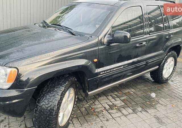 Джип Гранд Чероки 2002 в Днепре (Днепропетровске) на Automoto.ua Черный Джип Гранд Чероки, объемом двигателя 2.69 л и пробегом 400 тыс. км за 6000 $, фото 5 на Automoto.ua