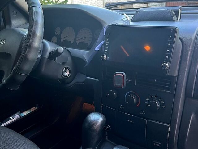 Джип Гранд Чероки 2002 в Днепре (Днепропетровске) на Automoto.ua Черный Джип Гранд Чероки, объемом двигателя 2.7 л и пробегом 300 тыс. км за 5000 $, фото 8 на Automoto.ua