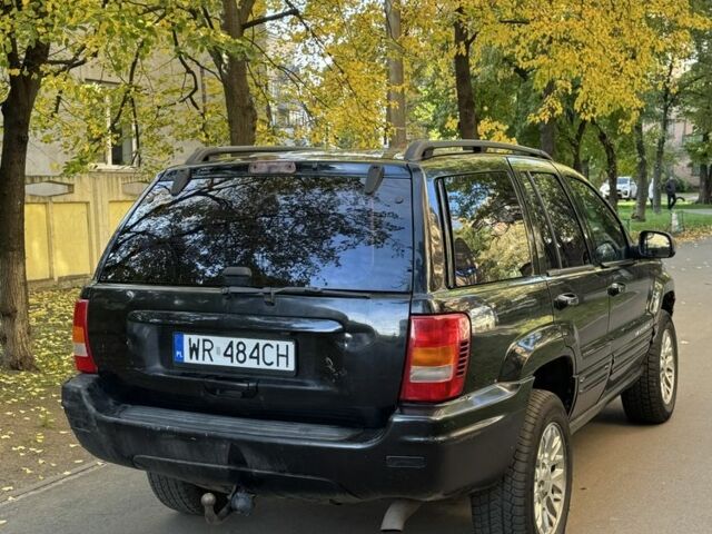 Джип Grand Cherokee 2002 у Києві на Automoto.ua Чорний Джип Grand Cherokee, об'ємом двигуна 0 л та пробігом 200 тис. км за 2599 $, фото 2 на Automoto.ua