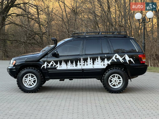 Чорний Джип Grand Cherokee, об'ємом двигуна 4 л та пробігом 320 тис. км за 8700 $, фото 2 на Automoto.ua