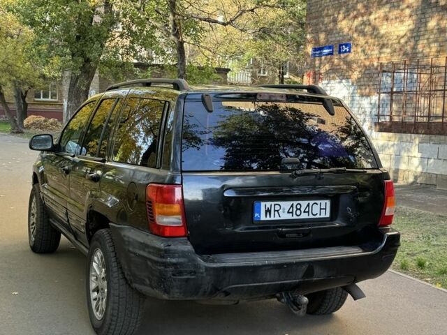 Джип Grand Cherokee 2002 у Києві на Automoto.ua Чорний Джип Grand Cherokee, об'ємом двигуна 0 л та пробігом 200 тис. км за 2599 $, фото 3 на Automoto.ua