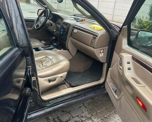 Чорний Джип Grand Cherokee, об'ємом двигуна 2.69 л та пробігом 409 тис. км за 6750 $, фото 3 на Automoto.ua