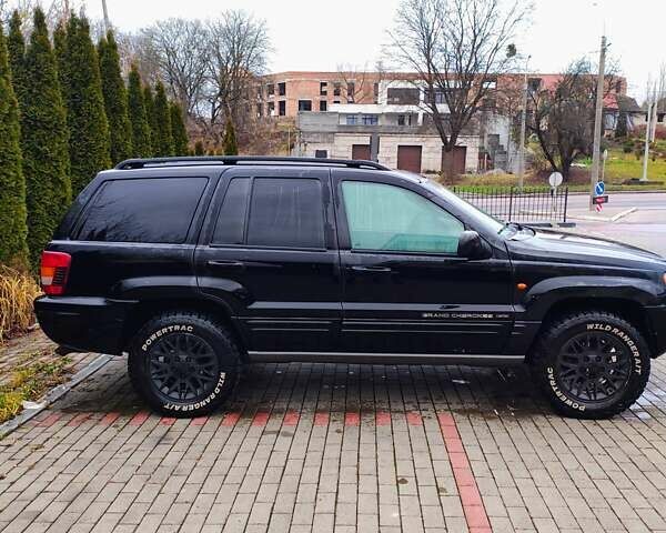 Черный Джип Гранд Чероки, объемом двигателя 2.69 л и пробегом 350 тыс. км за 5500 $, фото 2 на Automoto.ua
