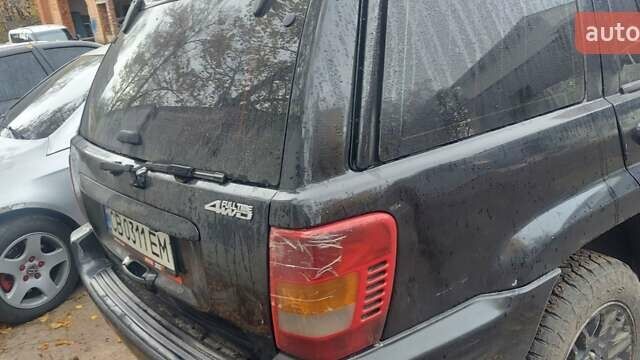 Чорний Джип Grand Cherokee, об'ємом двигуна 2.69 л та пробігом 254 тис. км за 7300 $, фото 3 на Automoto.ua