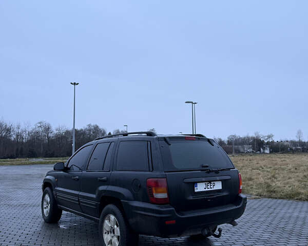 Чорний Джип Grand Cherokee, об'ємом двигуна 2.69 л та пробігом 300 тис. км за 9300 $, фото 13 на Automoto.ua