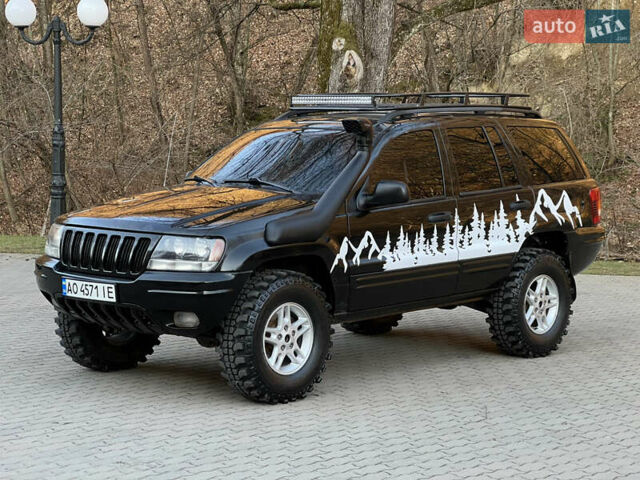 Чорний Джип Grand Cherokee, об'ємом двигуна 4 л та пробігом 320 тис. км за 8700 $, фото 1 на Automoto.ua