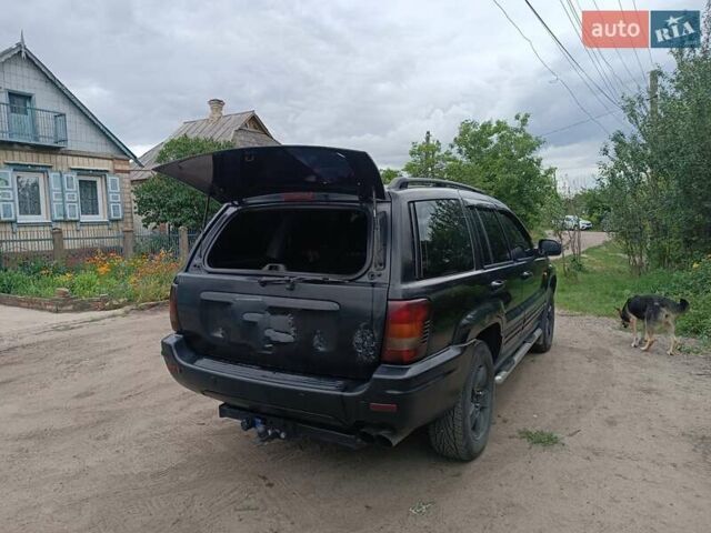 Чорний Джип Grand Cherokee, об'ємом двигуна 2.69 л та пробігом 265 тис. км за 9400 $, фото 6 на Automoto.ua