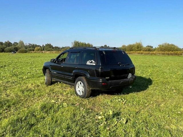 Черный Джип Гранд Чероки, объемом двигателя 0 л и пробегом 300 тыс. км за 7400 $, фото 7 на Automoto.ua