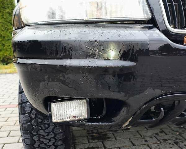 Черный Джип Гранд Чероки, объемом двигателя 2.69 л и пробегом 350 тыс. км за 5500 $, фото 10 на Automoto.ua