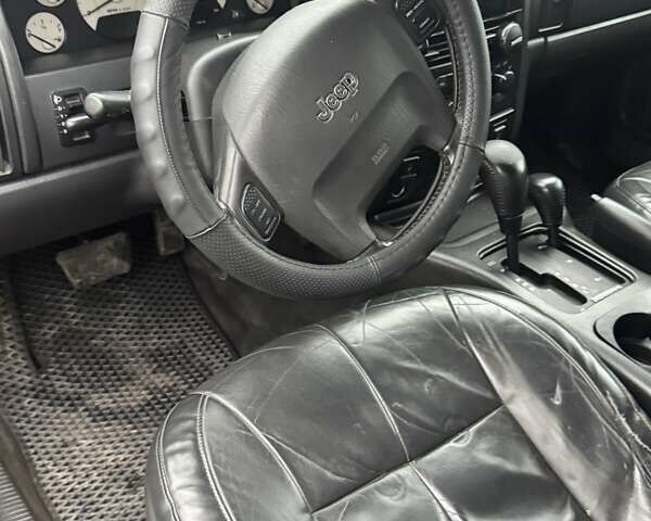 Черный Джип Гранд Чероки, объемом двигателя 2.69 л и пробегом 373 тыс. км за 5800 $, фото 10 на Automoto.ua