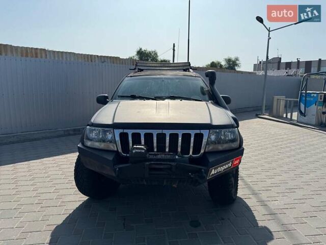Чорний Джип Grand Cherokee, об'ємом двигуна 4.7 л та пробігом 220 тис. км за 9400 $, фото 1 на Automoto.ua