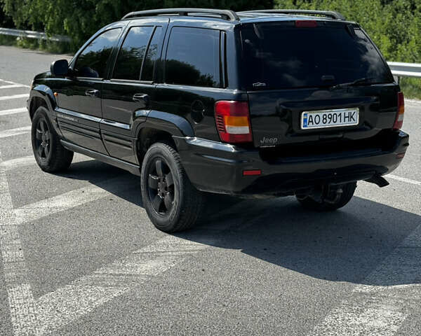 Чорний Джип Grand Cherokee, об'ємом двигуна 2.69 л та пробігом 257 тис. км за 7700 $, фото 3 на Automoto.ua