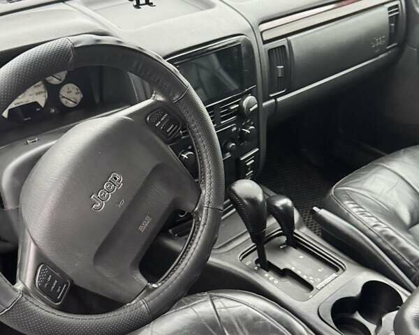 Черный Джип Гранд Чероки, объемом двигателя 2.69 л и пробегом 373 тыс. км за 5800 $, фото 11 на Automoto.ua
