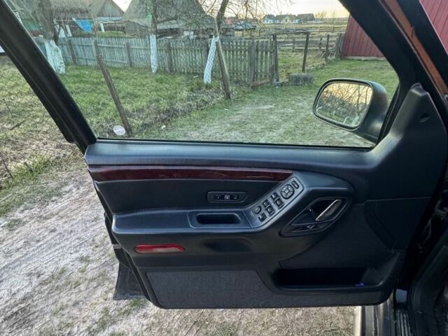 Чорний Джип Grand Cherokee, об'ємом двигуна 2.7 л та пробігом 288 тис. км за 7500 $, фото 3 на Automoto.ua