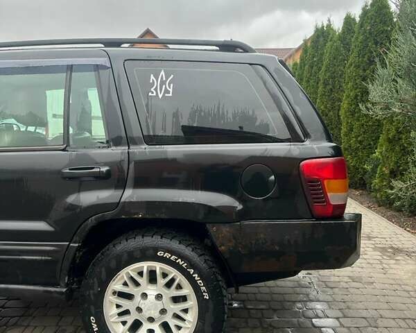 Чорний Джип Grand Cherokee, об'ємом двигуна 2.69 л та пробігом 409 тис. км за 6750 $, фото 7 на Automoto.ua