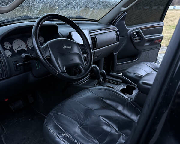 Чорний Джип Grand Cherokee, об'ємом двигуна 2.69 л та пробігом 300 тис. км за 9300 $, фото 8 на Automoto.ua