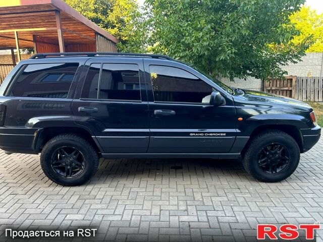 Чорний Джип Grand Cherokee, об'ємом двигуна 2.7 л та пробігом 300 тис. км за 5000 $, фото 1 на Automoto.ua