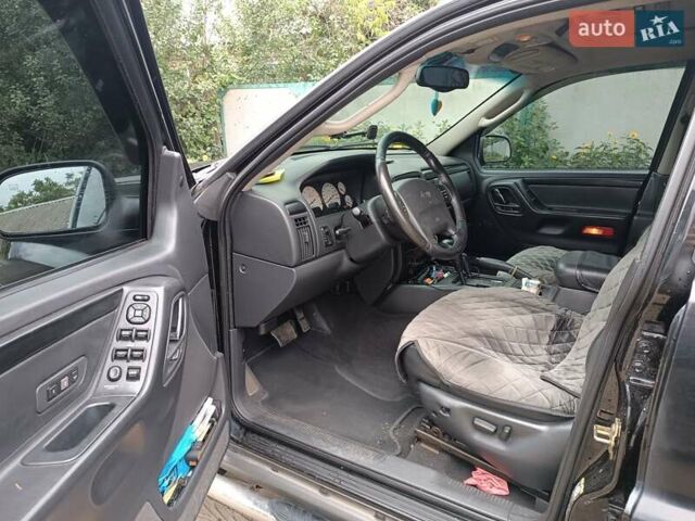 Чорний Джип Grand Cherokee, об'ємом двигуна 2.69 л та пробігом 265 тис. км за 9400 $, фото 10 на Automoto.ua