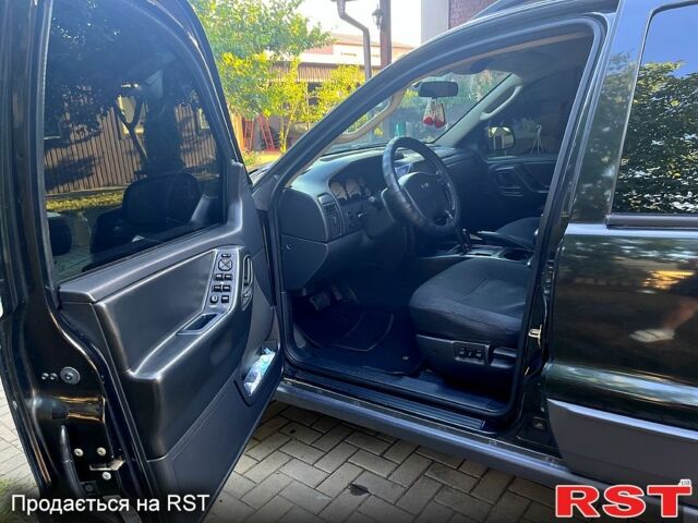 Чорний Джип Grand Cherokee, об'ємом двигуна 2.7 л та пробігом 300 тис. км за 5000 $, фото 5 на Automoto.ua