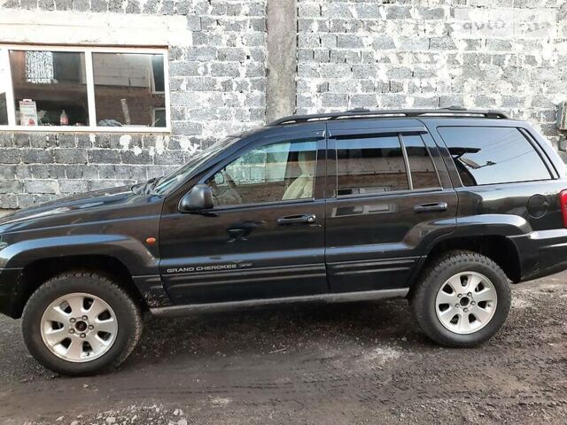 Чорний Джип Grand Cherokee, об'ємом двигуна 3.1 л та пробігом 235 тис. км за 8500 $, фото 15 на Automoto.ua