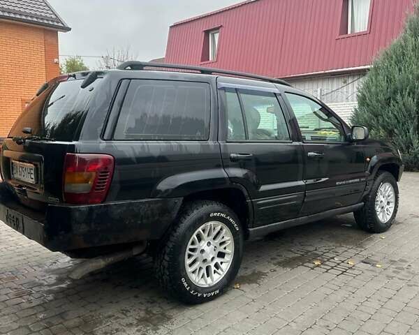Чорний Джип Grand Cherokee, об'ємом двигуна 2.69 л та пробігом 409 тис. км за 6750 $, фото 8 на Automoto.ua
