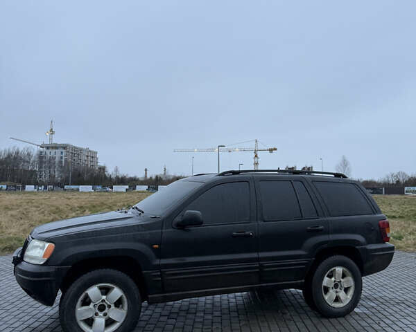 Чорний Джип Grand Cherokee, об'ємом двигуна 2.69 л та пробігом 300 тис. км за 9300 $, фото 2 на Automoto.ua