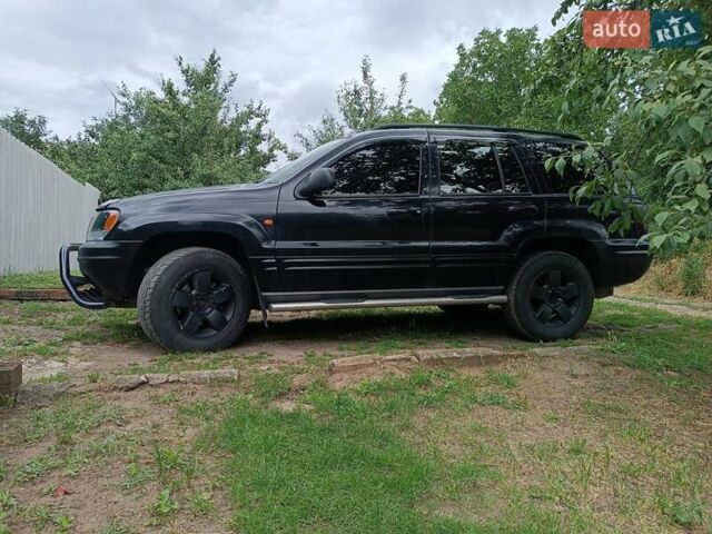 Чорний Джип Grand Cherokee, об'ємом двигуна 2.69 л та пробігом 265 тис. км за 9400 $, фото 2 на Automoto.ua