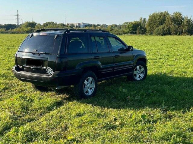 Черный Джип Гранд Чероки, объемом двигателя 0 л и пробегом 300 тыс. км за 7400 $, фото 3 на Automoto.ua