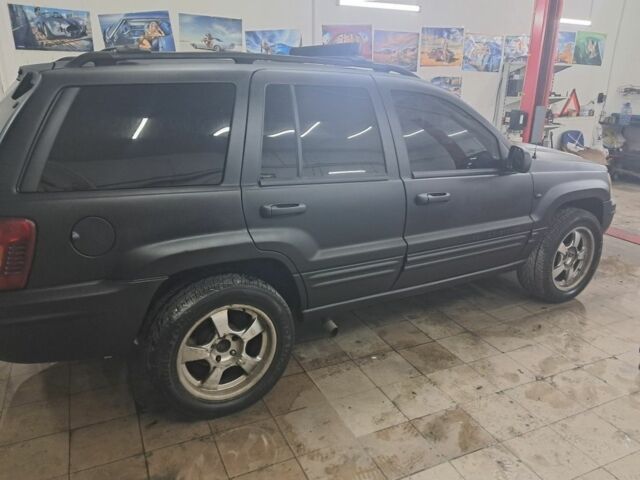 Черный Джип Гранд Чероки, объемом двигателя 4 л и пробегом 217 тыс. км за 4500 $, фото 4 на Automoto.ua