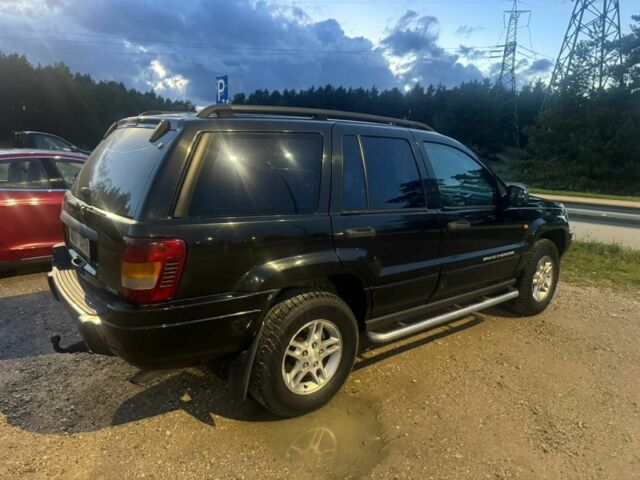 Черный Джип Гранд Чероки, объемом двигателя 2.7 л и пробегом 340 тыс. км за 6000 $, фото 2 на Automoto.ua