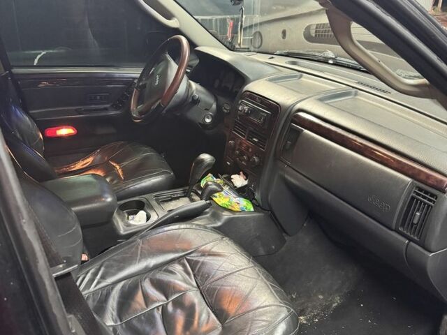 Черный Джип Гранд Чероки, объемом двигателя 2.7 л и пробегом 362 тыс. км за 4200 $, фото 6 на Automoto.ua