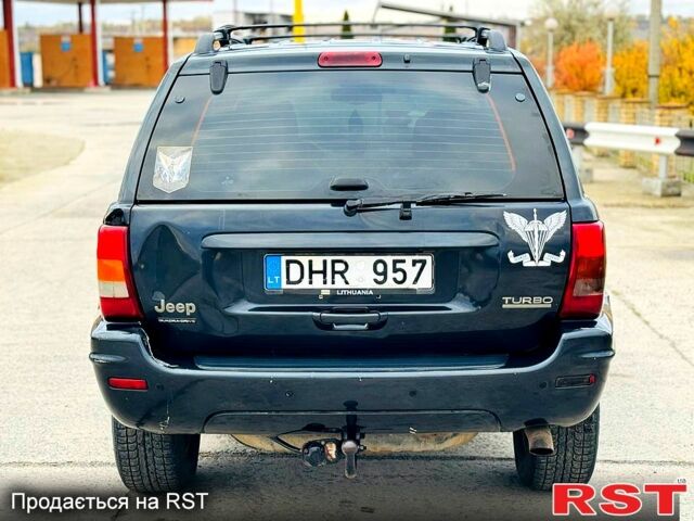 Джип Гранд Чероки 2003 в Новомосковске на Automoto.ua Черный Джип Гранд Чероки, объемом двигателя 3 л и пробегом 204 тыс. км за 3670 $, фото 4 на Automoto.ua