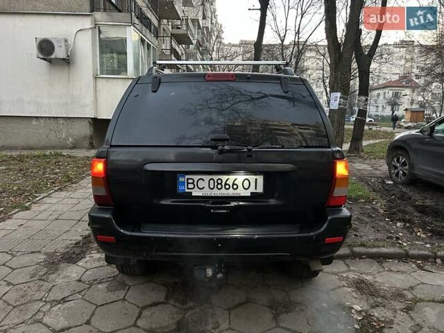 Джип Гранд Чероки 2003 в Измаиле на Automoto.ua Черный Джип Гранд Чероки, объемом двигателя 2.7 л и пробегом 370 тыс. км за 8500 $, фото 6 на Automoto.ua