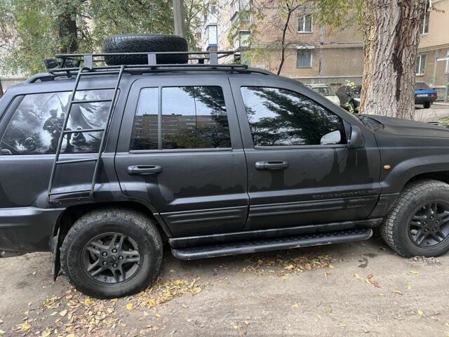 Черный Джип Гранд Чероки, объемом двигателя 2.7 л и пробегом 283 тыс. км за 6000 $, фото 3 на Automoto.ua