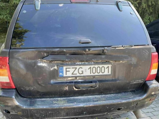 Черный Джип Гранд Чероки, объемом двигателя 2.69 л и пробегом 280 тыс. км за 3100 $, фото 4 на Automoto.ua