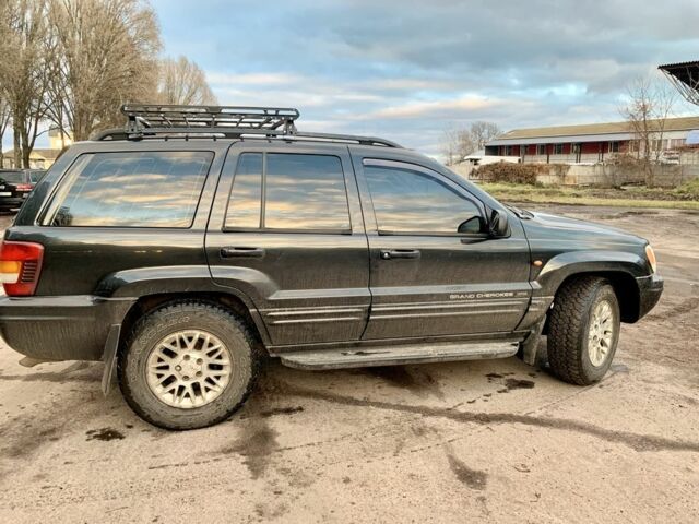 Черный Джип Гранд Чероки, объемом двигателя 2.7 л и пробегом 240 тыс. км за 5500 $, фото 4 на Automoto.ua