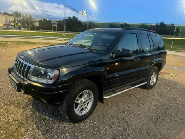 Черный Джип Гранд Чероки, объемом двигателя 2.7 л и пробегом 340 тыс. км за 6000 $, фото 1 на Automoto.ua
