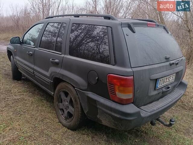 Черный Джип Гранд Чероки, объемом двигателя 2.69 л и пробегом 380 тыс. км за 4700 $, фото 12 на Automoto.ua