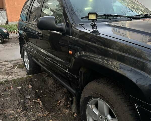 Джип Гранд Чероки 2003 в Измаиле на Automoto.ua Черный Джип Гранд Чероки, объемом двигателя 2.7 л и пробегом 370 тыс. км за 8500 $, фото 2 на Automoto.ua