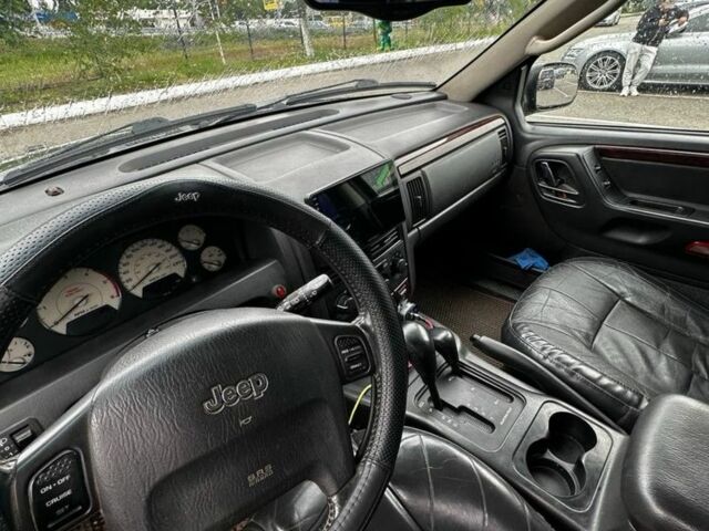 Черный Джип Гранд Чероки, объемом двигателя 2.7 л и пробегом 3 тыс. км за 4500 $, фото 7 на Automoto.ua