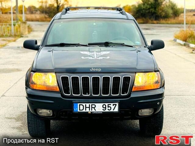 Джип Гранд Чероки 2003 в Новомосковске на Automoto.ua Черный Джип Гранд Чероки, объемом двигателя 3 л и пробегом 204 тыс. км за 3670 $, фото 5 на Automoto.ua